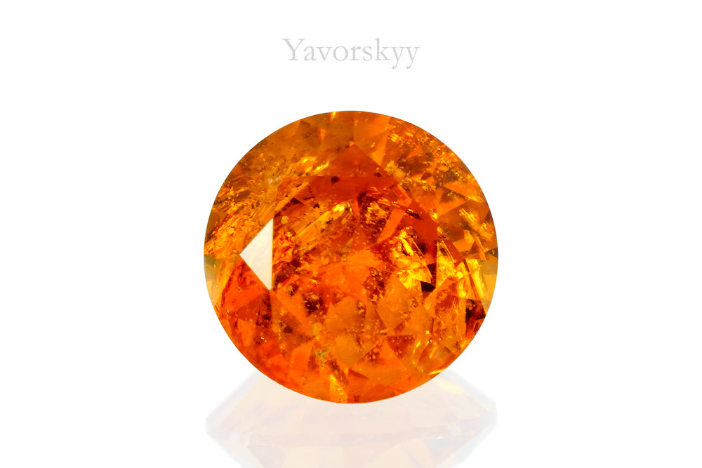 The photo of clinohumite 0.85 ct front view