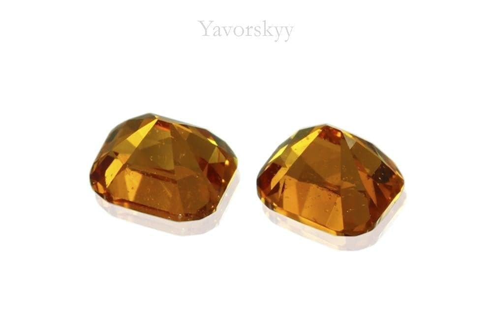 A match pair of clinohumite cushion 0.49 carats back view image