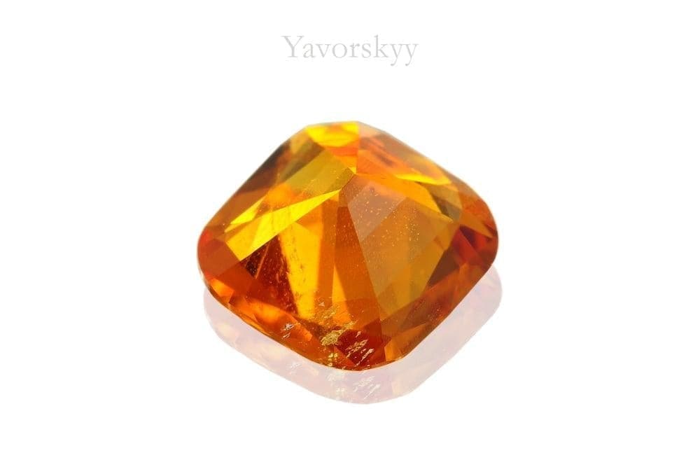 Photo of bottom view of clinohumite 0.76 carat