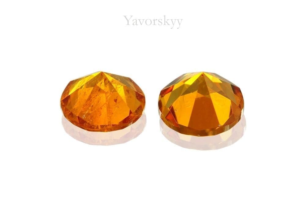 Photo of bottom view of clinohumite 0.95 carat matched pair