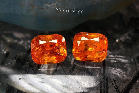 A matched pair of clinohumite cushion 1.34 carats front view pictur