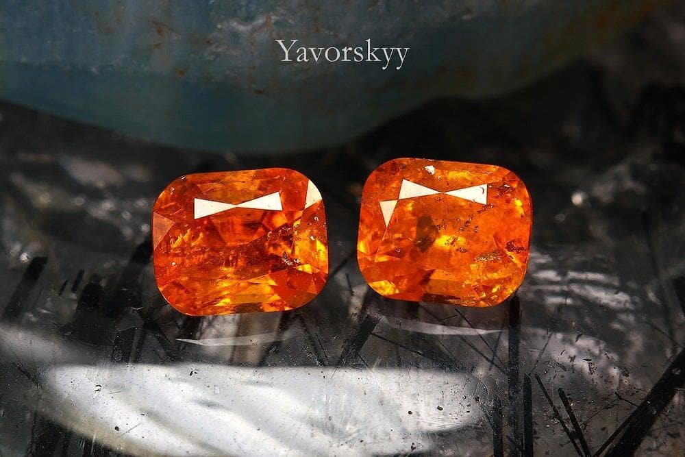 A matched pair of clinohumite cushion 1.34 carats front view pictur