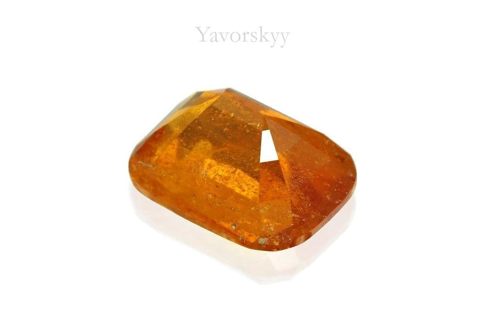 Photo of orange shape clinohumite 1.97 cts bottom view