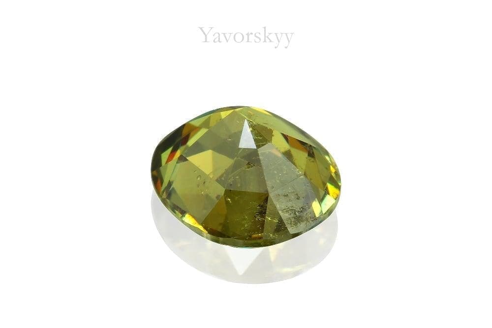 Photo of bottom view of demantoid 0.67 ct
