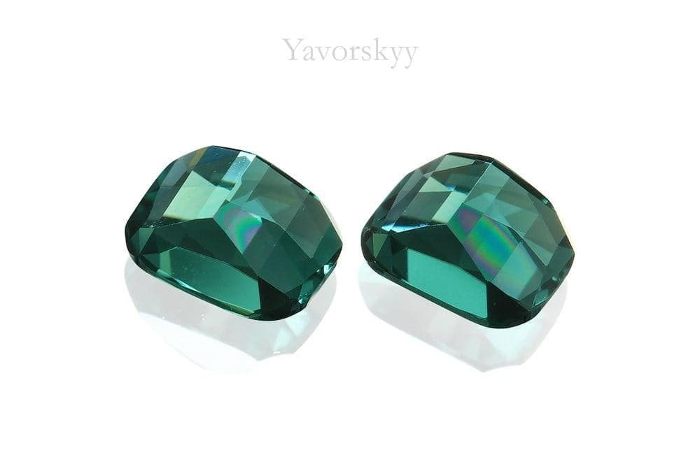 Photo of bottom view of green tourmaline 0.44 carat matched pair
