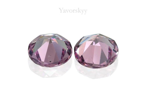 Photo of match pair malaia garnet 1.66 carats round cut