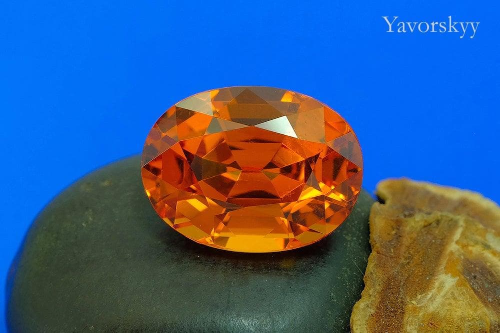 Oval cut mandarin garnet 7.05 carats front view photo