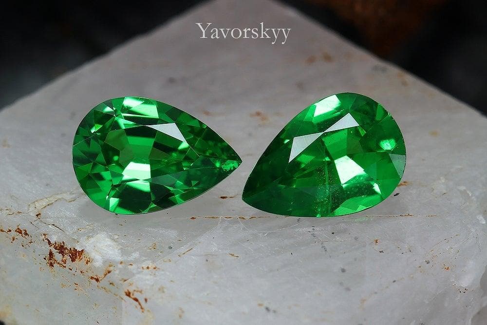 Pair of tsavorite pear 1.01 carat front view photo