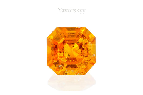 Photo of orange shape clinohumite 0.48 ct front view