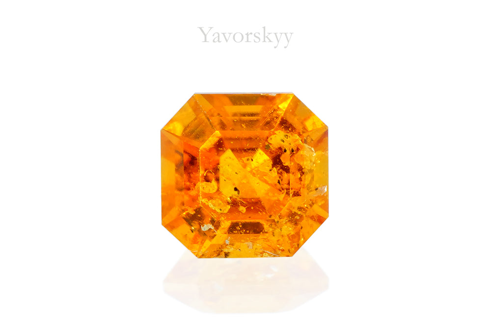 Photo of orange shape clinohumite 0.48 ct front view
