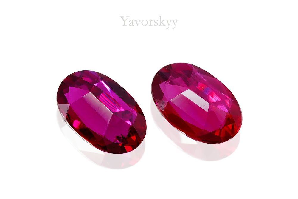 Match pair of ruby oval 0.6 carat front view photo