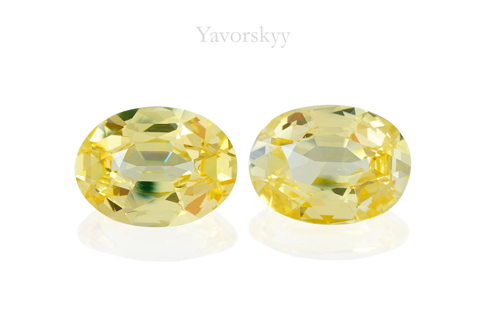 Top view photo of oval yellow sapphire 6.48 cts pair