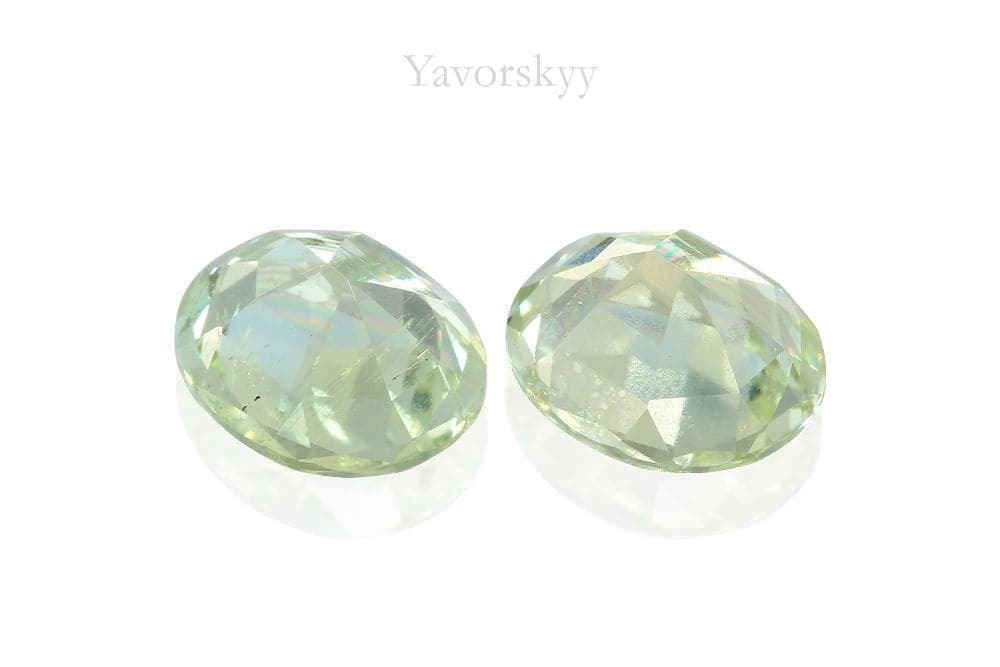 A matched pair of green beryl oval 1.42 carats back side picture