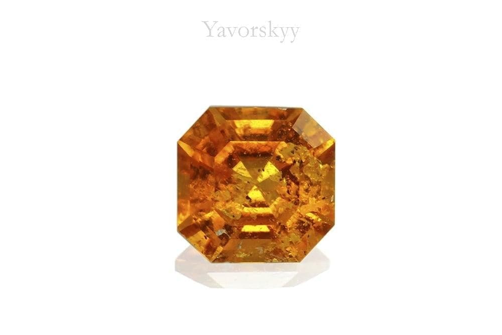 Photo of orange shape clinohumite 0.48 ct front view