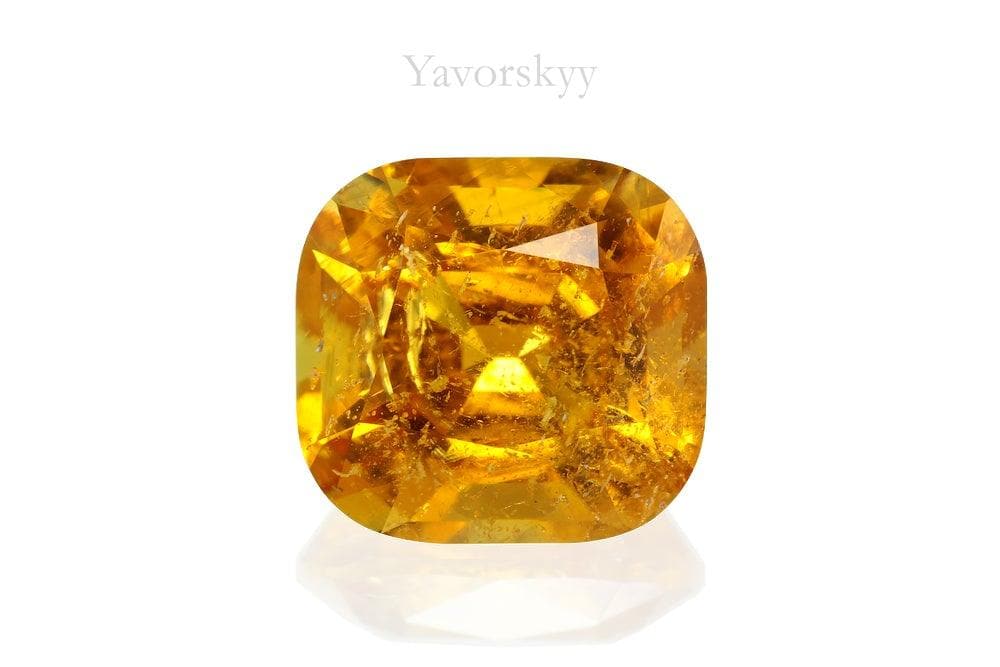 Photo of orange shape clinohumite 2.45 cts front view