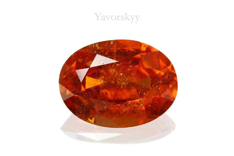 4.04 carats clinohumite oval cut front view photo