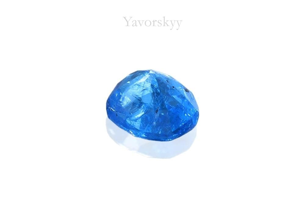 A bottom view photo of 0.09 ct blue spinel oval