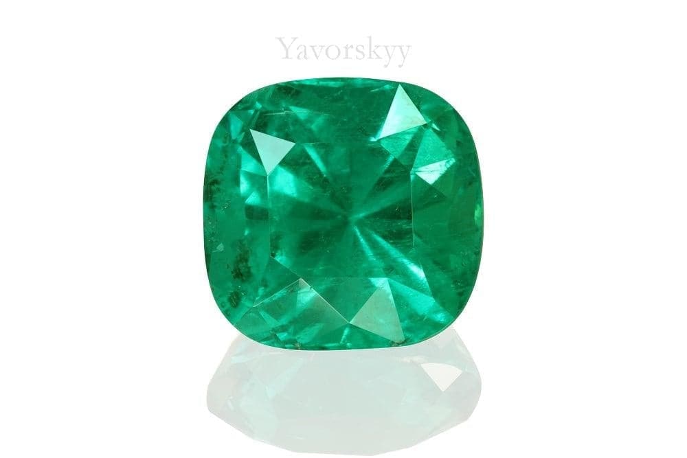 The photo of cushion shape green emerald 11.84 cts