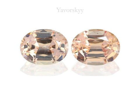 A pair of orange malaia garnet oval 3.24 carats front view picture
