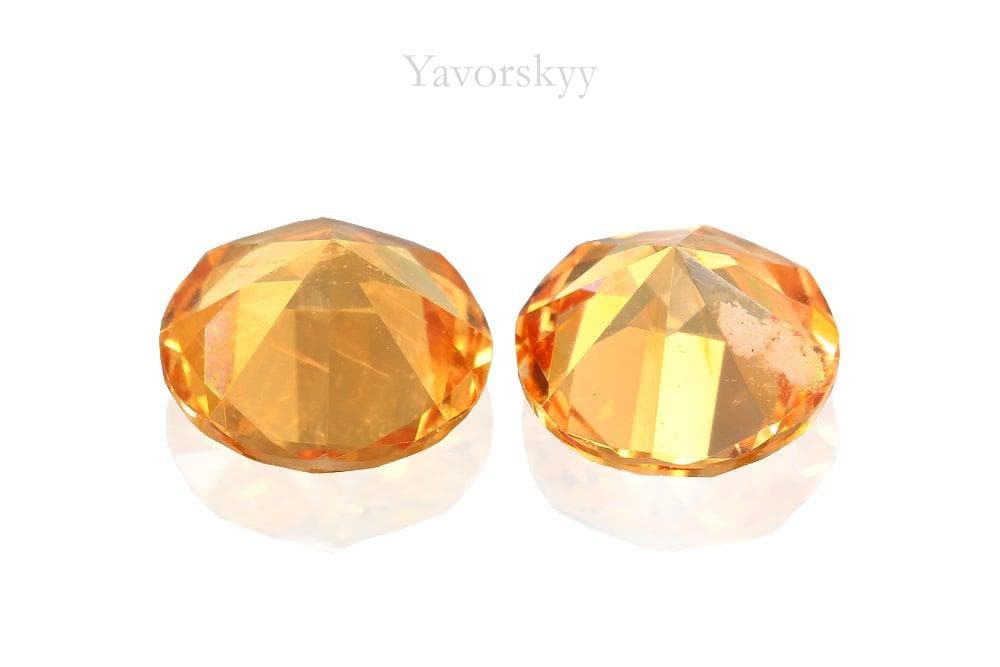 Bottom view picture of round mandarin garnet 1.24 carats pair