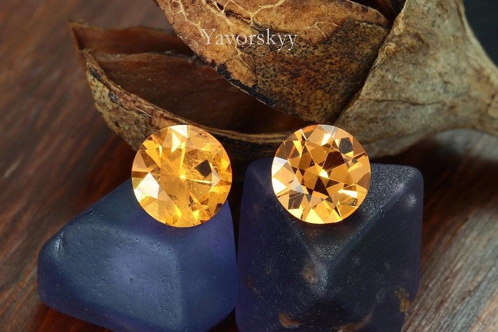 A pair of mandarin garnet round 1.24 cts front view image