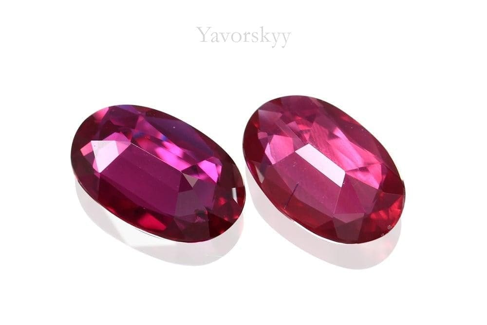 Match pair of ruby oval 0.6 carat front view photo