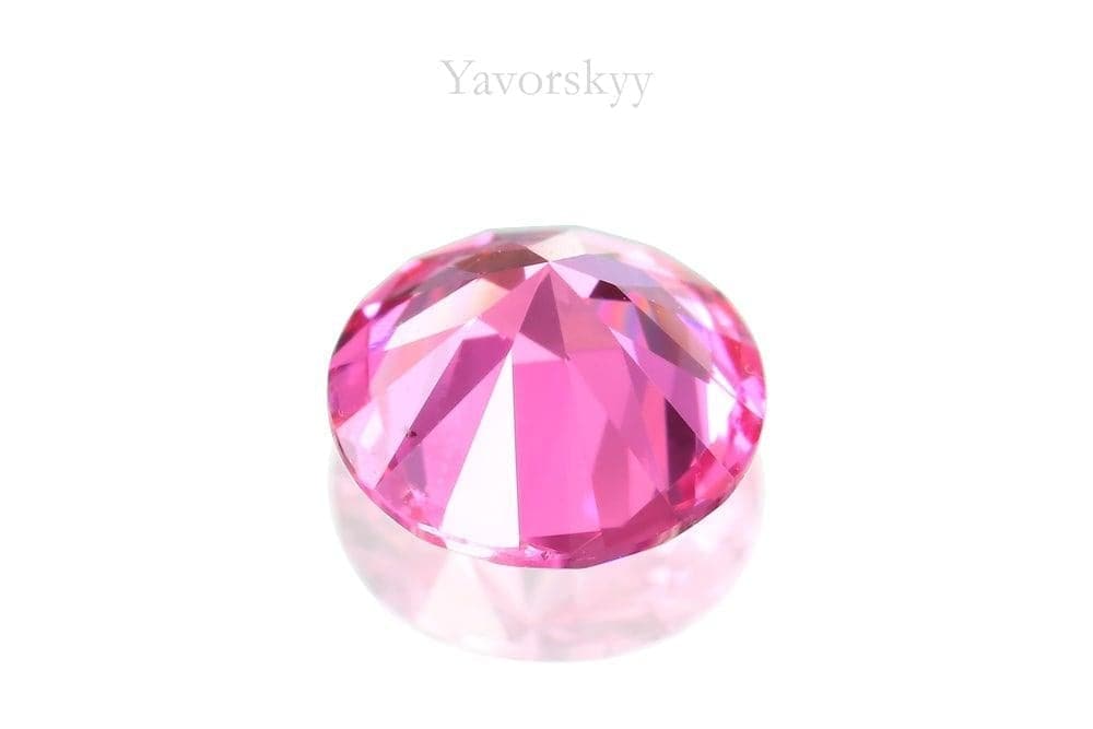 Image of round cut pink spinel 0.57 ct bottom view